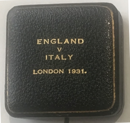 Black medal box with England V Italy London 1931 embossed on lid in gold